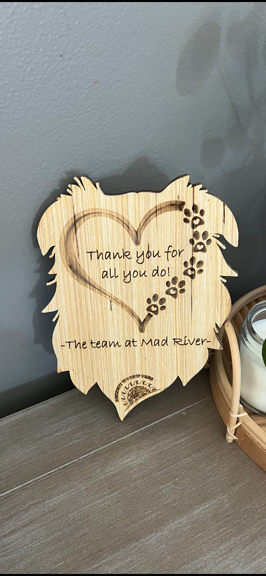 Personalized engraving on back of wood item.